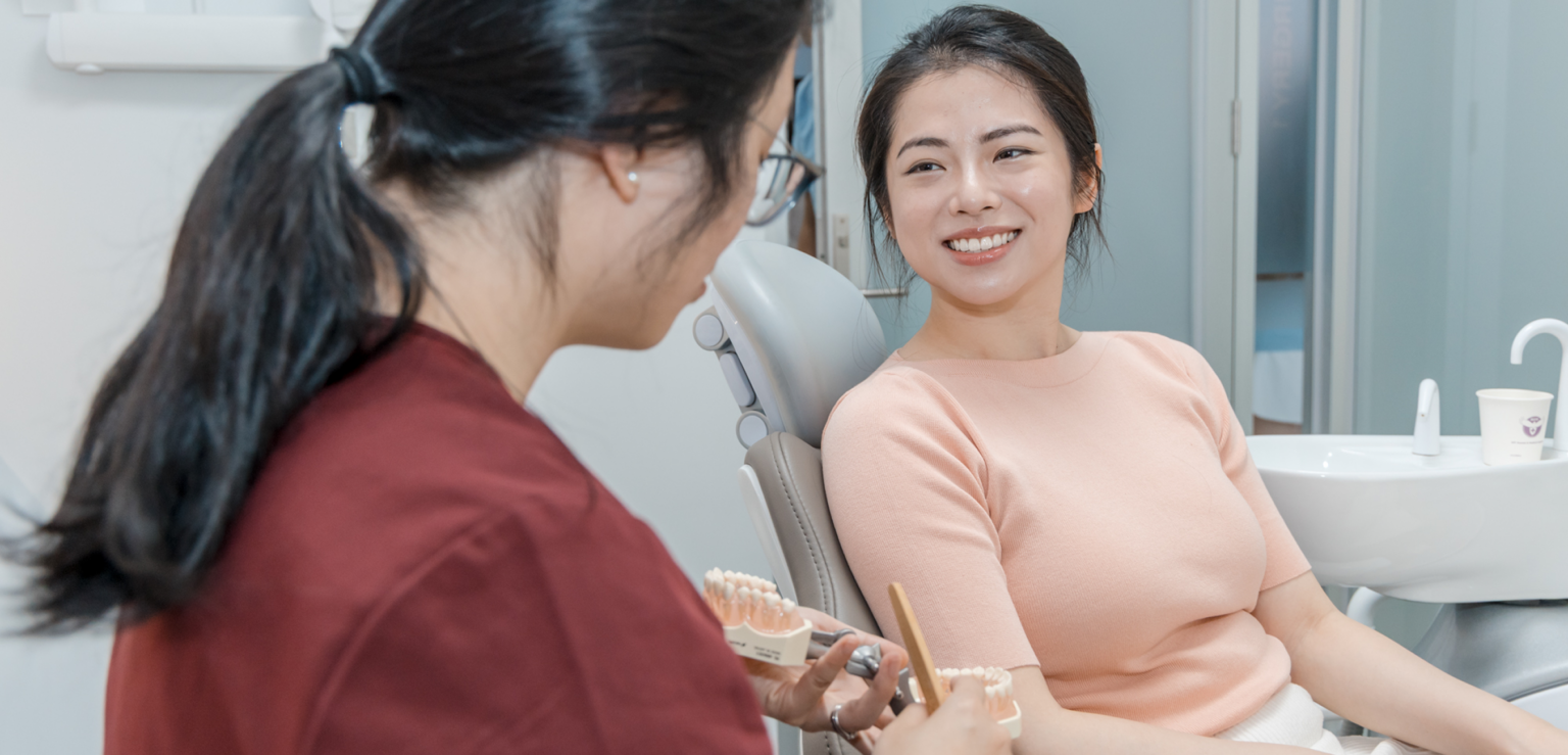 T32 Dentist Nadia seeing patient in the clinic