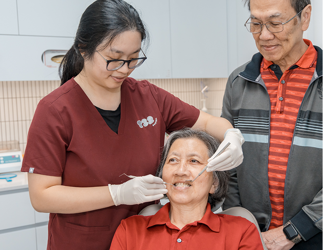 Dentist performs a dental examination for an elder patient, a crucial step for achieving a radiant teeth whitening result.